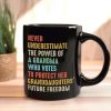 Never Underestimate The Power Of A Grandma Who Votes To Protect Her Granddaughters' Future Freedom Mug